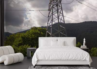 Electric pole on dramatic sky background Wall mural