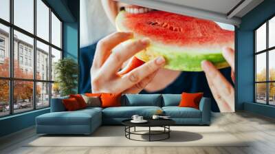 young adult woman eating watermelon fruit Wall mural