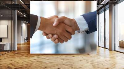 a close up of a handshake between two men. Wall mural