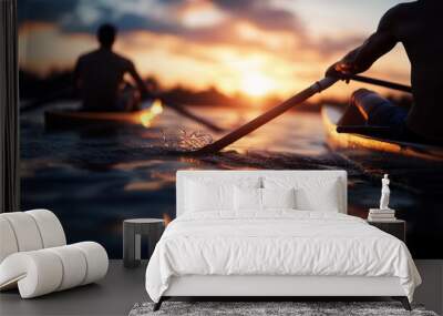 Two rowers in a boat on a lake at sunset. Wall mural