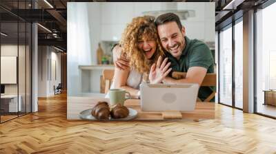 couple husband and wife man woman use digital tablet for video call Wall mural