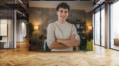 Portrait of teenage boy caucasian teen male young man stand at home Wall mural