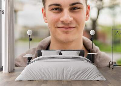 portrait of young Caucasian man teenager 18 or 19 years old outdoor Wall mural