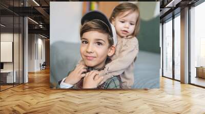 siblings portrait caucasian boy and girl brother and sister at home Wall mural