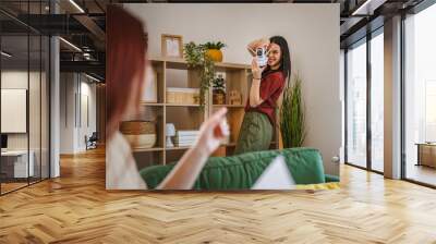 two women sisters connect install cctv security surveillance camera Wall mural