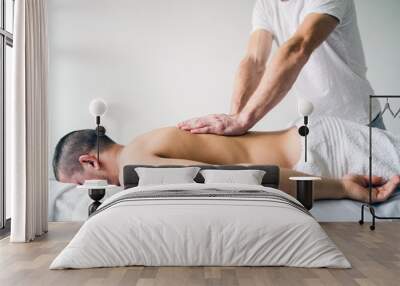 Young Man having massage  Wall mural