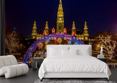 The Illuminating gate in front of the Christmas market by City hall -  Rathaus in night Vienna, Austria. Wall mural