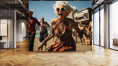 Stylish very old lady in is dancing at a beach open air summer party. Grandmother in eyeglasses with white hair. Active aging concept. Wall mural