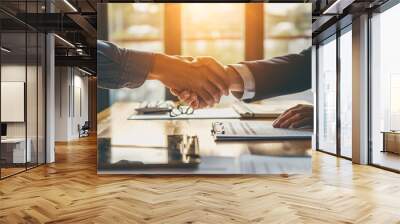 Two business people shaking hand after business signing contract in meeting room at company office Wall mural