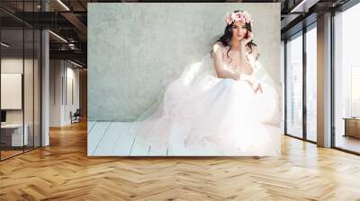 Beautiful bride woman in tulle roses wedding dress, lifestyle portrait Wall mural