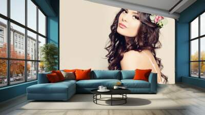 Beautiful Woman with Curly Hair, Makeup and Flowers Wreath Wall mural