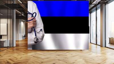 Estonian medicine and healthcare concept. Doctor close up against flag of Estonia background Wall mural