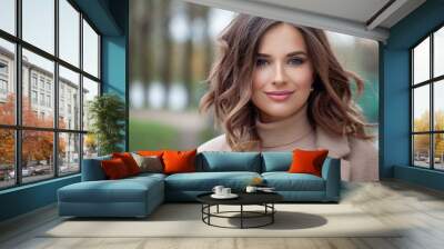 Fashionable female model face. Beautiful brunette outdoor Wall mural