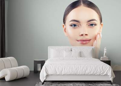 Natural beautiful woman with clear skin, female face close up Wall mural