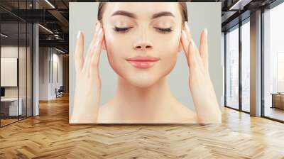 Smiling woman with clear skin. Skincare and facial treatment concept Wall mural