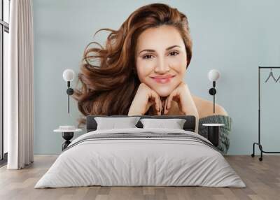 Smiling Woman with Red Curly Hair. Happy Redhead Model Wall mural