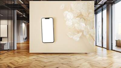 Top view mobile mockup with lunaria leaves on beige background
 Wall mural