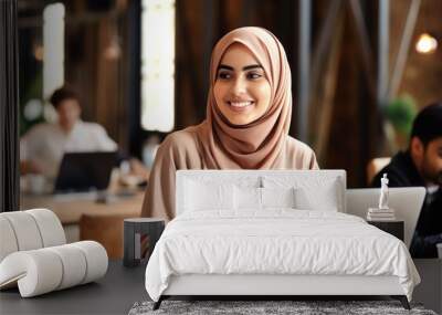 Attractive millennial Asian Muslim businesswoman or female office worker wearing hijab having an online meeting or webinar with her team, waving hand to greet her coworker. AI Generated Wall mural