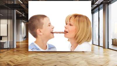 portrait of happy european family of son and his mother eating c Wall mural