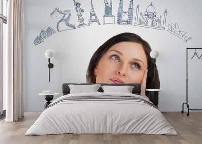 Young pretty woman dreaming about her vacation. Famous touristic Wall mural