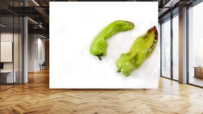 Two ugly funny green bell peppers isolated on white background. Vegetarian food concept. Copy space. Wall mural