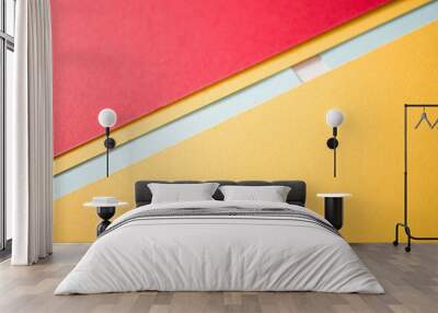 Yellow and red background diagonally divided with blue line and little white square, retro concept Wall mural