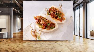 Asian fusion vegan white soft bao with fermented and fresh vegetables, spicy sauce and crunchy onion flakes Wall mural