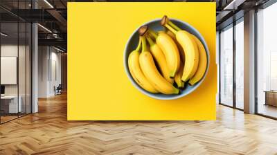 bowl of bananas on yellow background. generative ai Wall mural