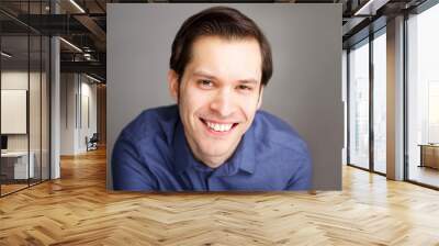 Close up attractive business man smiling with confidence Wall mural