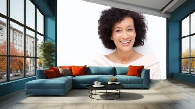 Close up attractive middle age african american woman smiling against white background Wall mural