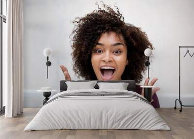 Close up front horizontal portrait of happy young african american woman Wall mural