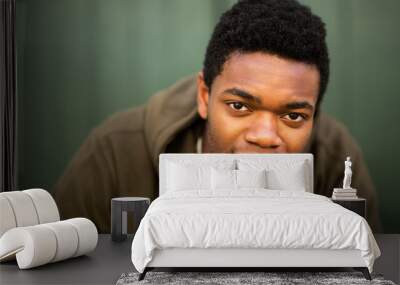 Close up handsome young african american man staring Wall mural