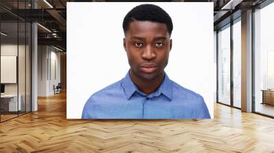 Close up handsome young black man against isolated white background Wall mural