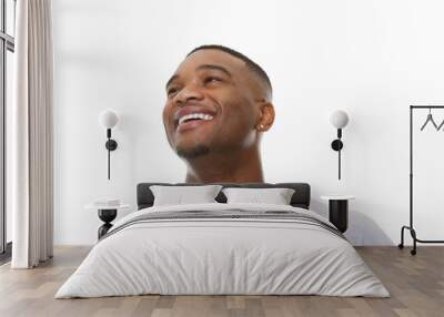 Close up portrait of a happy young african american man laughing Wall mural