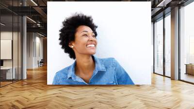 close up portrait of smiling woman looking up Wall mural