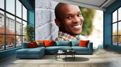 handsome young african man smiling Wall mural