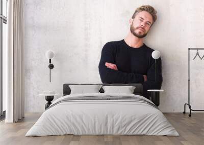 male fashion model with beard posing with arms crossed Wall mural