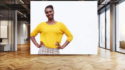 smiling young african american woman posing against isolated white background Wall mural