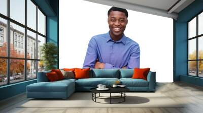 smiling young black man in blue shirt posing with arms crossed against isolated white background Wall mural