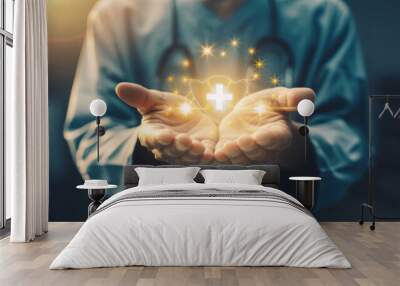 A doctor holds a holographic health protection symbol above his hand, symbolizing a commitment to health care in the medical context. Wall mural