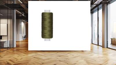 green spool of sewing thread isolated on white background close up Wall mural