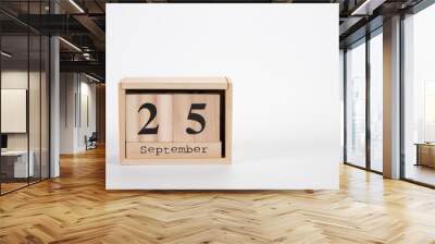 Wooden calendar September 25 on a white background Wall mural