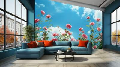 Beautiful rose garden, clouds and blue sky in the background Wall mural