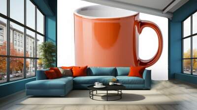 A ceramic mug with a handle. The mug is orange and has a white interior. Wall mural