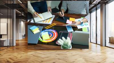 Advertising agency designer creative start-up team discussing ideas in office. Wall mural