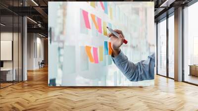 Attractive meeting at nonprofit boardroom group of employees at conference table workers collaborate in discussion Wall mural