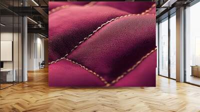 Close-up of luxurious red fabric with plush texture and intricate stitching. Wall mural