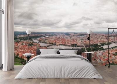 Prague Old Town in Czech Republic with Famous Sightseeing Places in Background. Charles Bridge Iconic 14th century Structure with View, Vltava river and Prague Cityscape. Must Visit City. Drone Wall mural