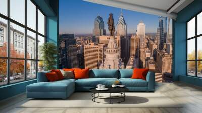 Statue of William Penn. William Penn is a bronze statue by Alexander Milne Calder of William Penn. It is located atop the Philadelphia City Hall, Pennsylvania. Wall mural