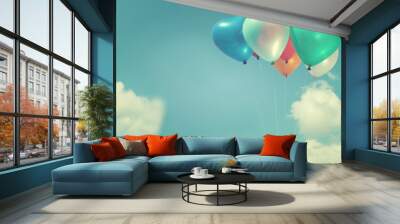 The colorful heart-shaped balloons with blue sky background in vintage style, concept of love in summer and valentine, wedding Wall mural